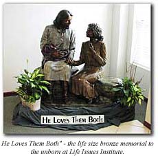 "He Loves Them Both" statue